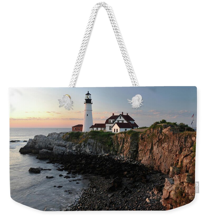 Water's Edge Weekender Tote Bag featuring the photograph Portland Head Light by Aimintang