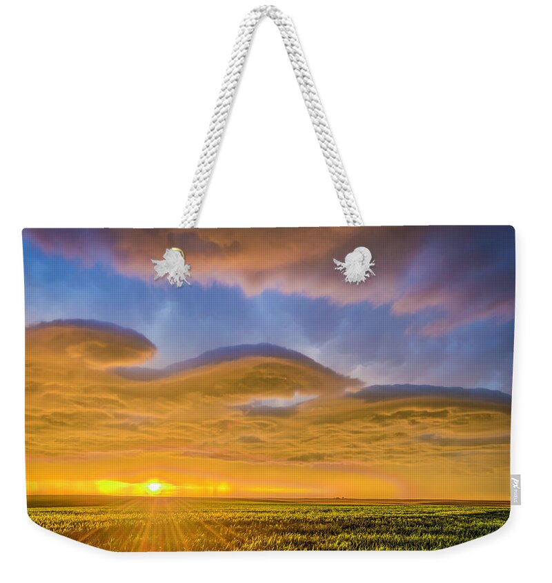Clouds Weekender Tote Bag featuring the photograph Poured Gold by Laura Hedien