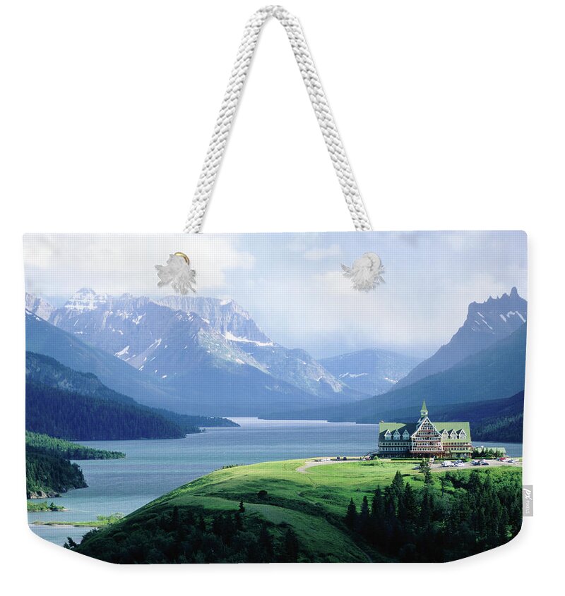 Scenics Weekender Tote Bag featuring the photograph Prince Of Wales Hotel, With Waterton by John Elk
