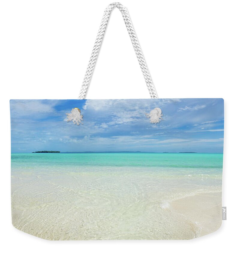 Aitutaki Weekender Tote Bag featuring the photograph Pure Blue Bliss by Becqi Sherman