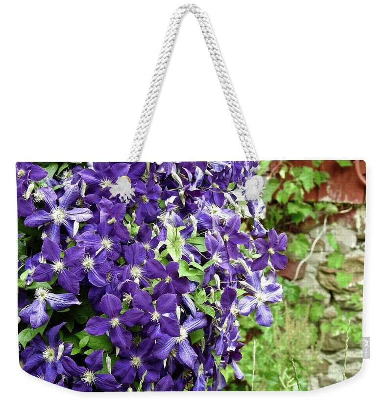 Purple Weekender Tote Bag featuring the photograph Purple Floral Cascade by Kathy Chism