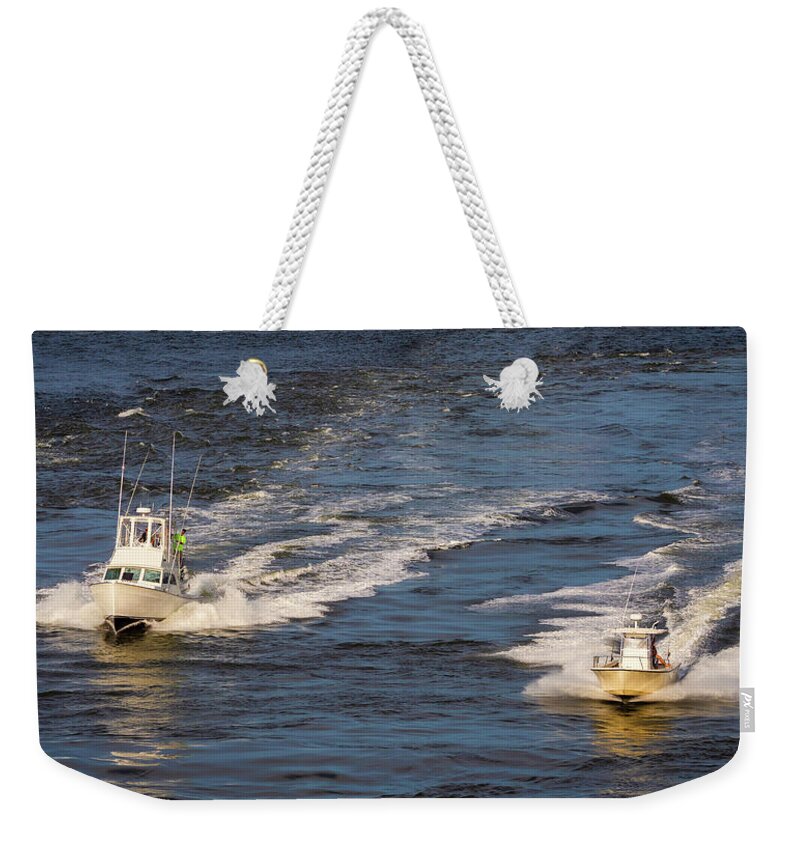 Boats Weekender Tote Bag featuring the photograph Racing to the Harbor by David Kay