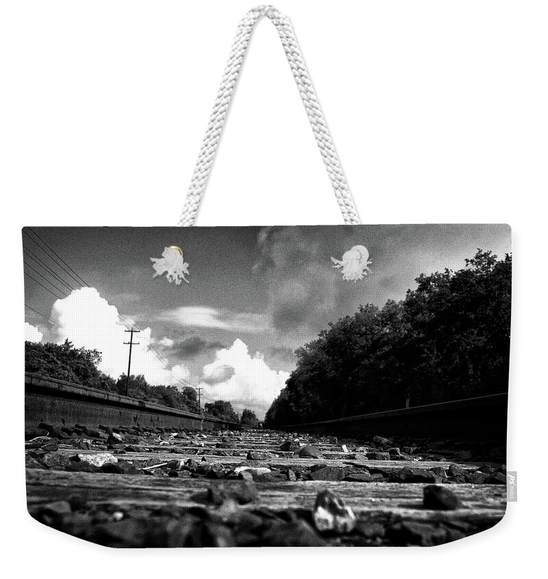 Tranquility Weekender Tote Bag featuring the photograph Railroad Crossing Low-angle Black And by Jose Caceres Photography