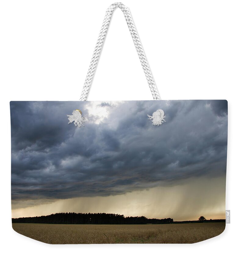 Wind Weekender Tote Bag featuring the photograph Rain Shower by Cschoeps