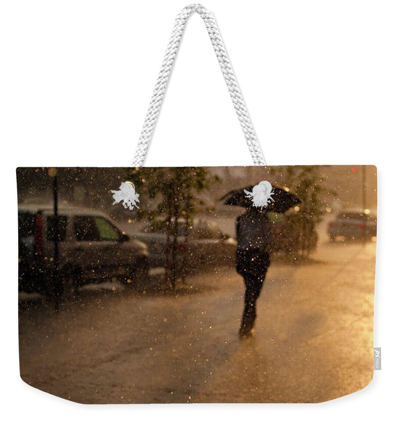 People Weekender Tote Bag featuring the photograph Rain Sunset by Joseph O. Holmes / Portfolio.streetnine.com