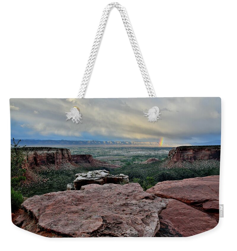 Colorado National Monument Weekender Tote Bag featuring the photograph Rainbow over Book Cliffs from Grand View Point by Ray Mathis