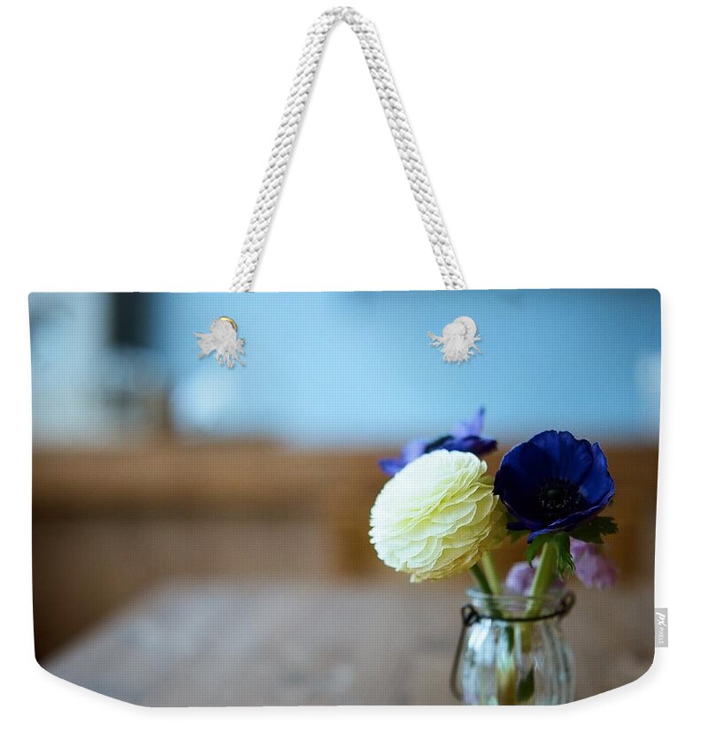 Vase Weekender Tote Bag featuring the photograph Ranunculus And Anemones by Junghyun Photo