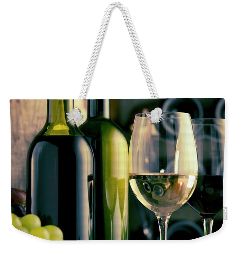 Cheese Weekender Tote Bag featuring the photograph Red And White Wine In A Winecellar by Kontrast-fotodesign