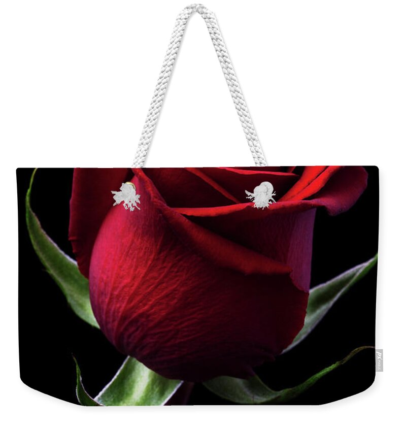 Black Background Weekender Tote Bag featuring the photograph Red Rose by Iwan Tirtha