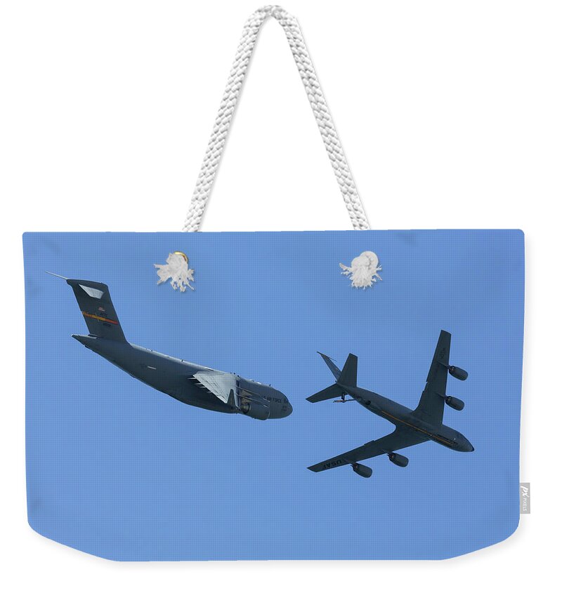 Refueling Weekender Tote Bag featuring the photograph Refueling Complete by John Daly