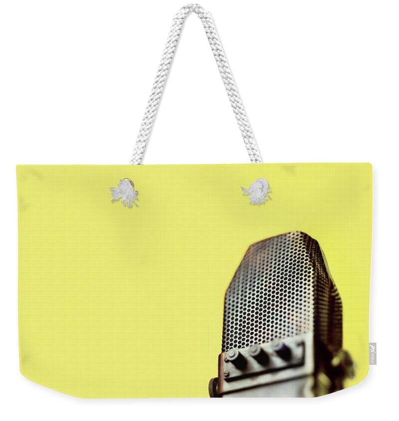 Anticipation Weekender Tote Bag featuring the photograph Retro Ribbon Microphone by Peter Dazeley