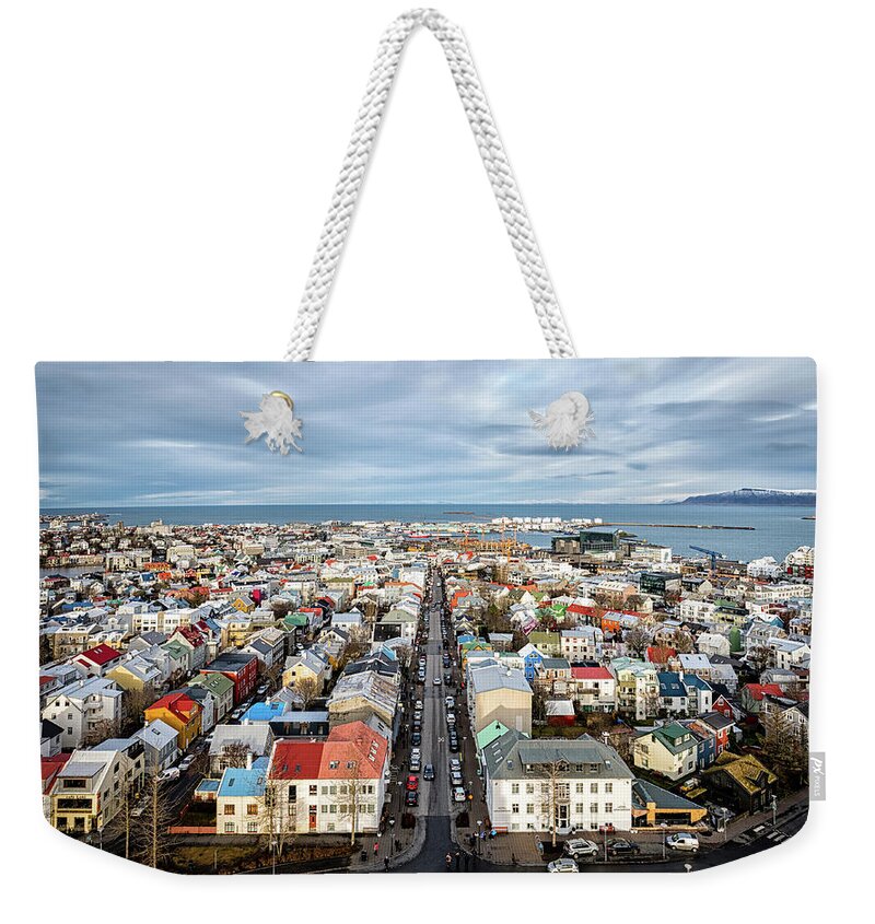 Hallgrimskirkja Weekender Tote Bag featuring the photograph Reykjavik City 1 by Nigel R Bell