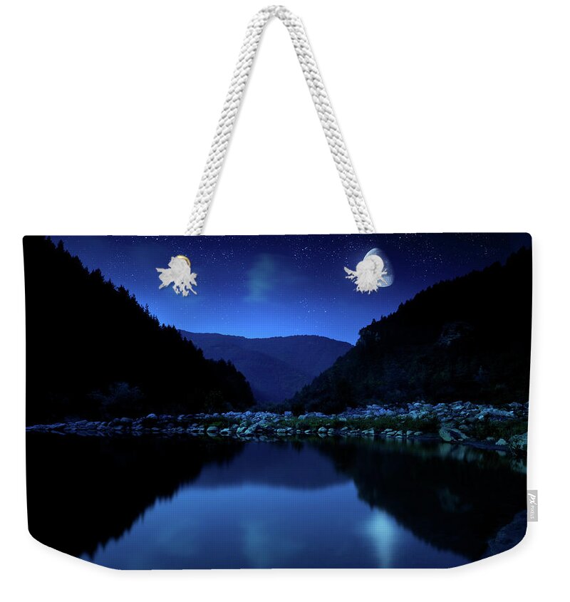 Water's Edge Weekender Tote Bag featuring the photograph Rising Moon Over Lake by Da-kuk
