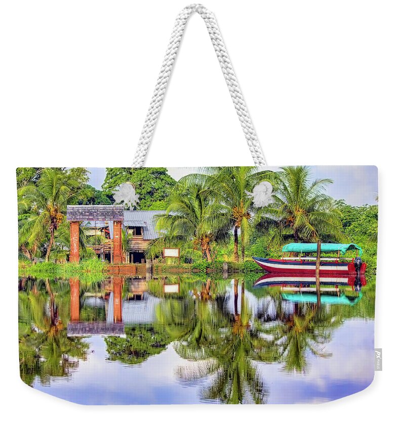 Suriname Weekender Tote Bag featuring the photograph River Reflections by Nadia Sanowar