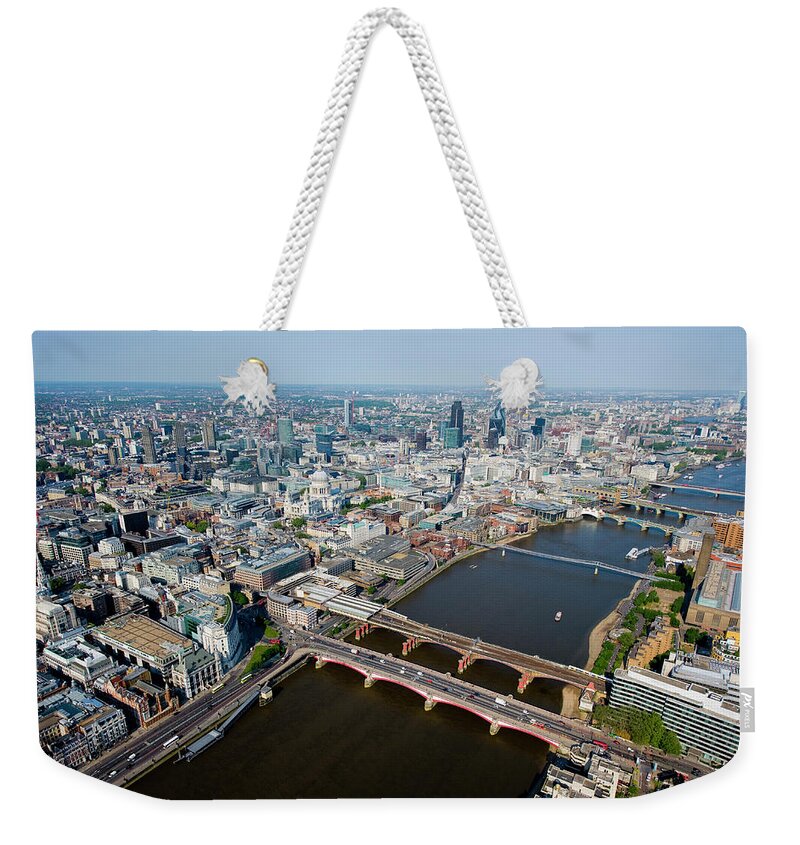 England Weekender Tote Bag featuring the photograph River Thames And City Of London by Jason Hawkes