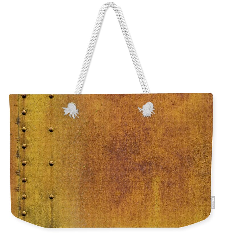Orange Color Weekender Tote Bag featuring the photograph Rivets And Rust Texture by Roundhill