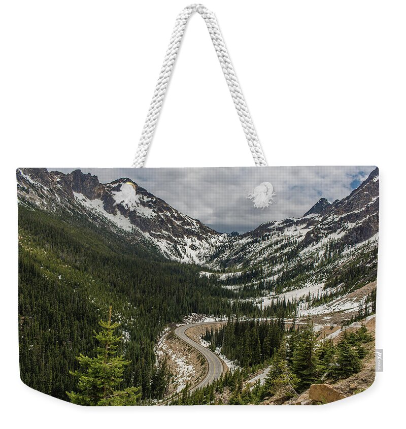 Road Weekender Tote Bag featuring the photograph Road between the mountain, North Casacades National Park,Washington  by Julieta Belmont