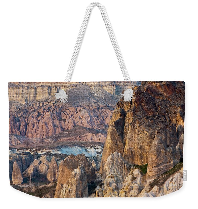 Scenics Weekender Tote Bag featuring the photograph Rock Formations In Cappadocia, Turkey by Ashok Sinha