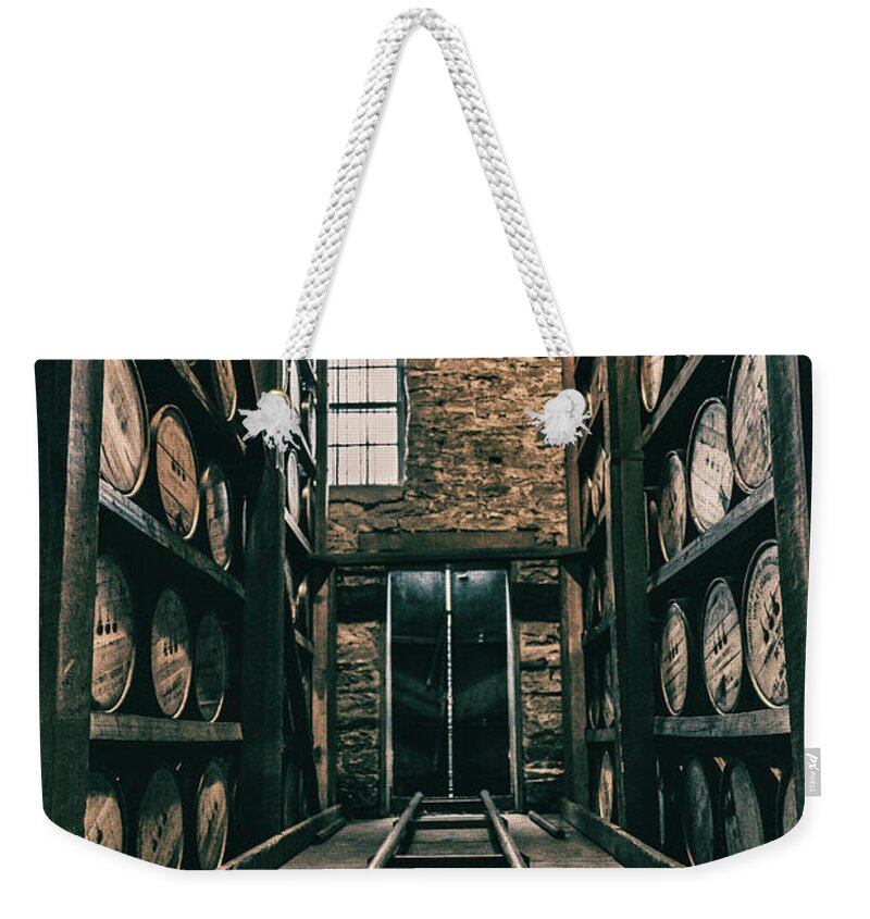  Weekender Tote Bag featuring the photograph Rolling Barrel by Joseph Caban