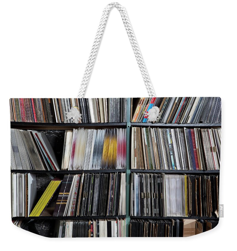 Berlin Weekender Tote Bag featuring the photograph Rows Of Records On Shelves by Halfdark