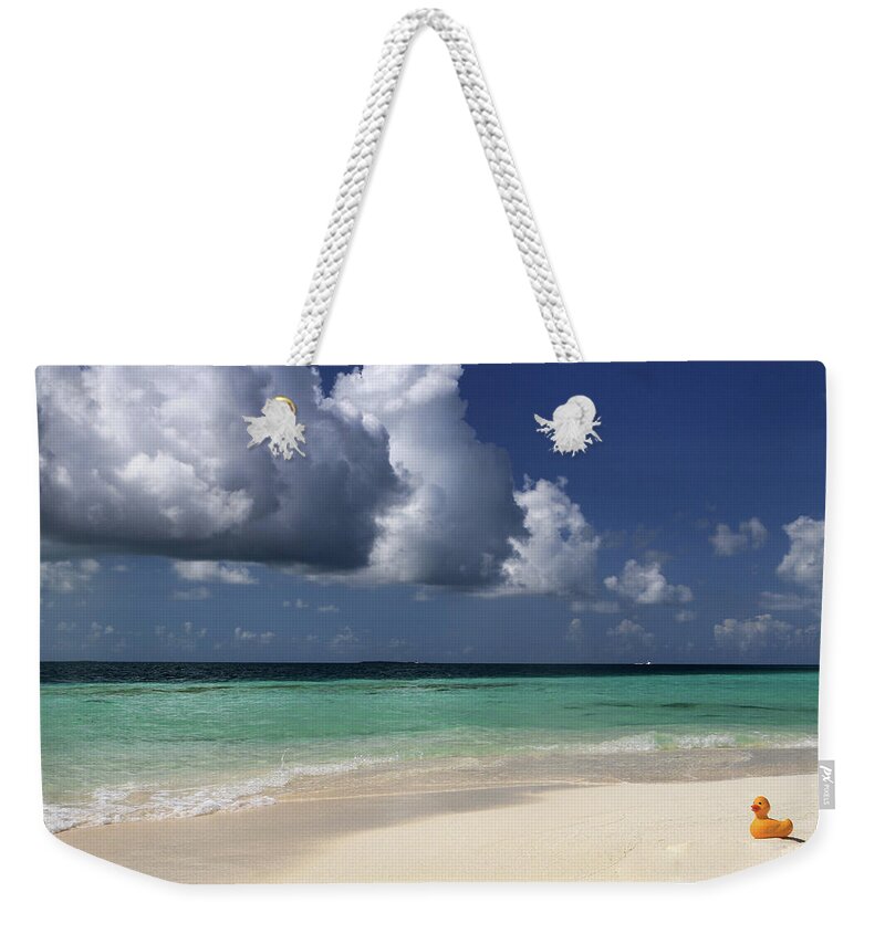 Archipelago Weekender Tote Bag featuring the photograph Rubber Duckie On The Beach by C. Quandt Photography
