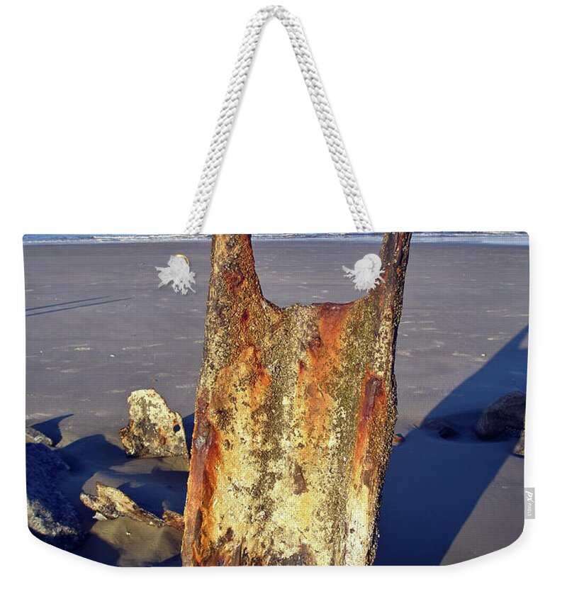 Aging Process Weekender Tote Bag featuring the photograph Rusted Iron Jetties by Joseph Shields