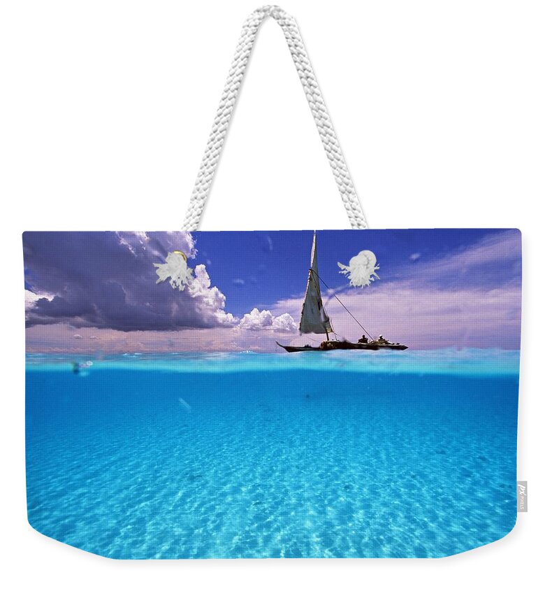 Estock Weekender Tote Bag featuring the digital art Sailboat In Turquoise Waters by Guido Cozzi