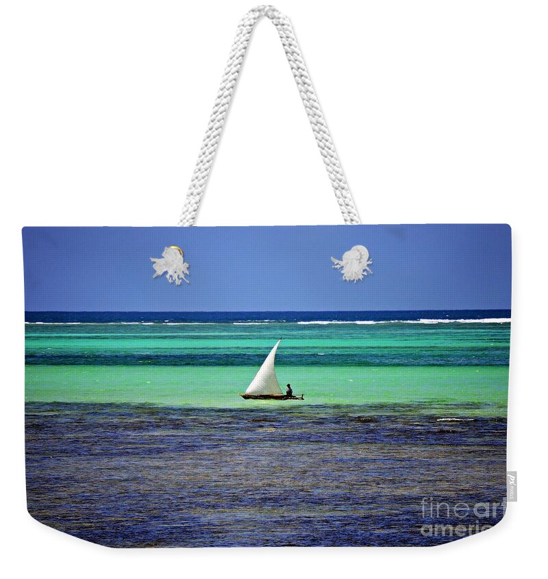 Sailboat Weekender Tote Bag featuring the photograph Sailing at Zanzibar by Thomas Schroeder