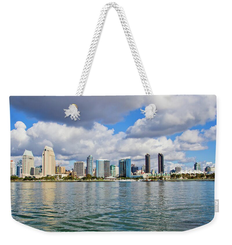 Tranquility Weekender Tote Bag featuring the photograph San Diego Skyline From The Water by Raquel Lonas