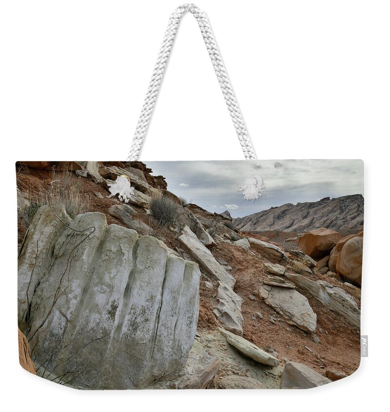 County Road 1028 Weekender Tote Bag featuring the photograph San Rafael Swell from I-70 in Utah by Ray Mathis