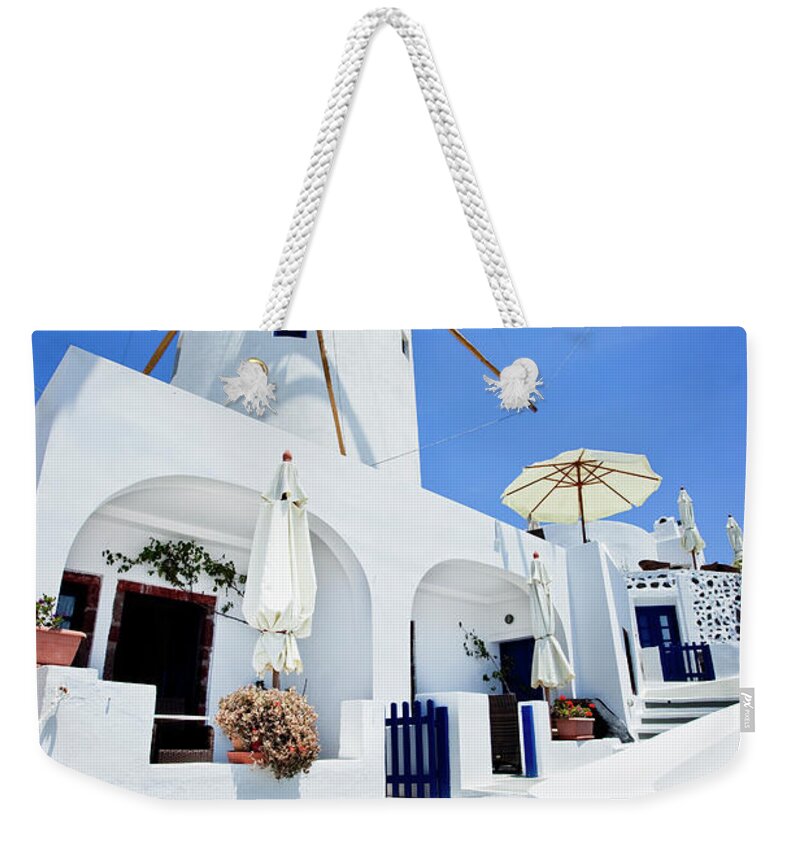 Curve Weekender Tote Bag featuring the photograph Santorini Idyllic Hotel In Oia by Mbbirdy