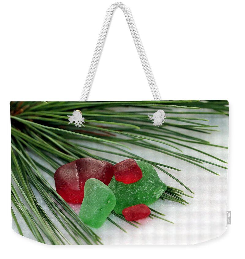 Sea Glass Weekender Tote Bag featuring the photograph Sea glass and pine needles by Janice Drew