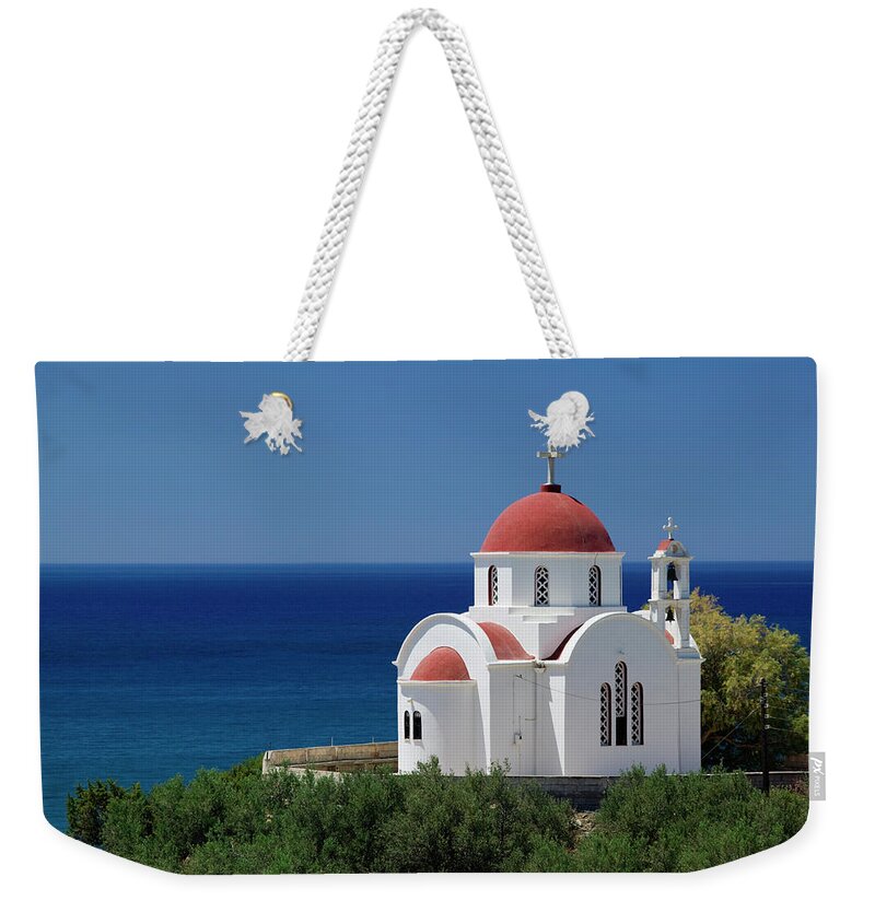 Greece Weekender Tote Bag featuring the photograph Seaside Chapel, Lasithi Province by Walter Bibikow