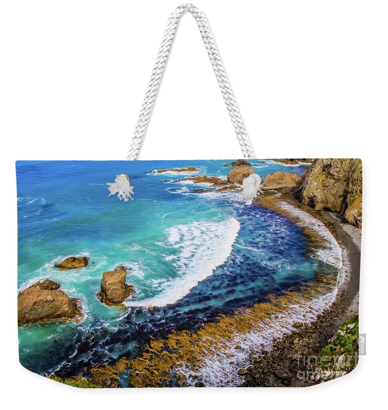 Bay Weekender Tote Bag featuring the photograph Roaring Bay at Nugget Point by Lyl Dil Creations