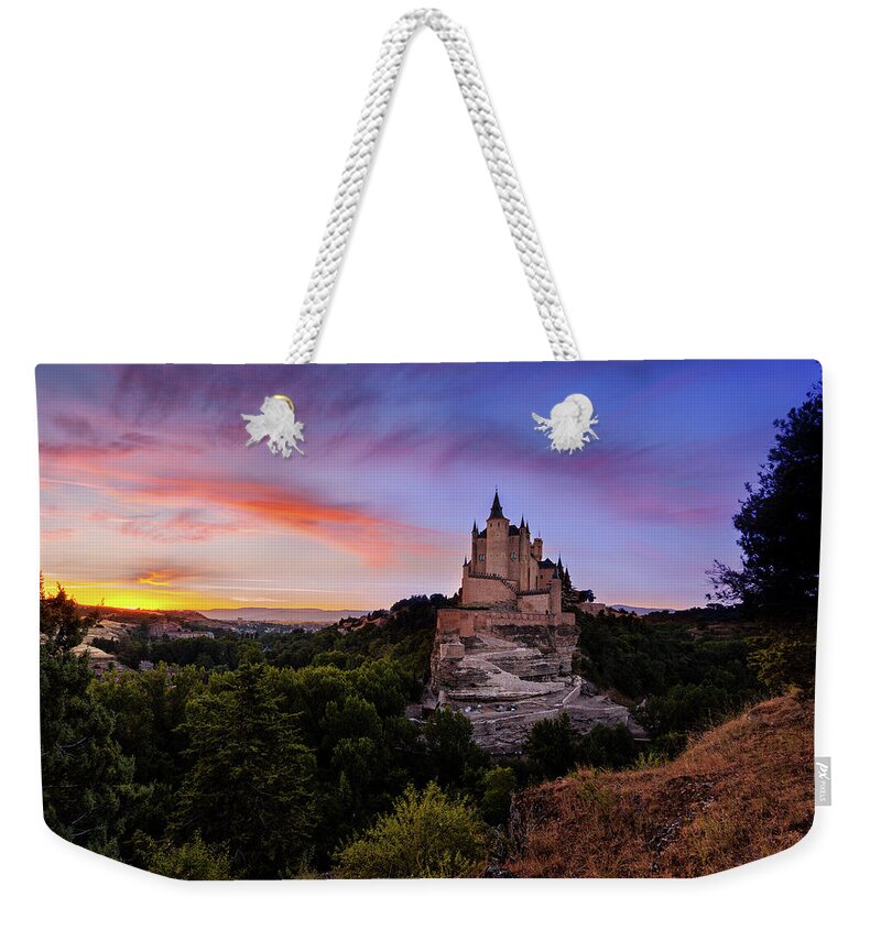 Segovi Weekender Tote Bag featuring the photograph The wizard's spell by Jorge Maia
