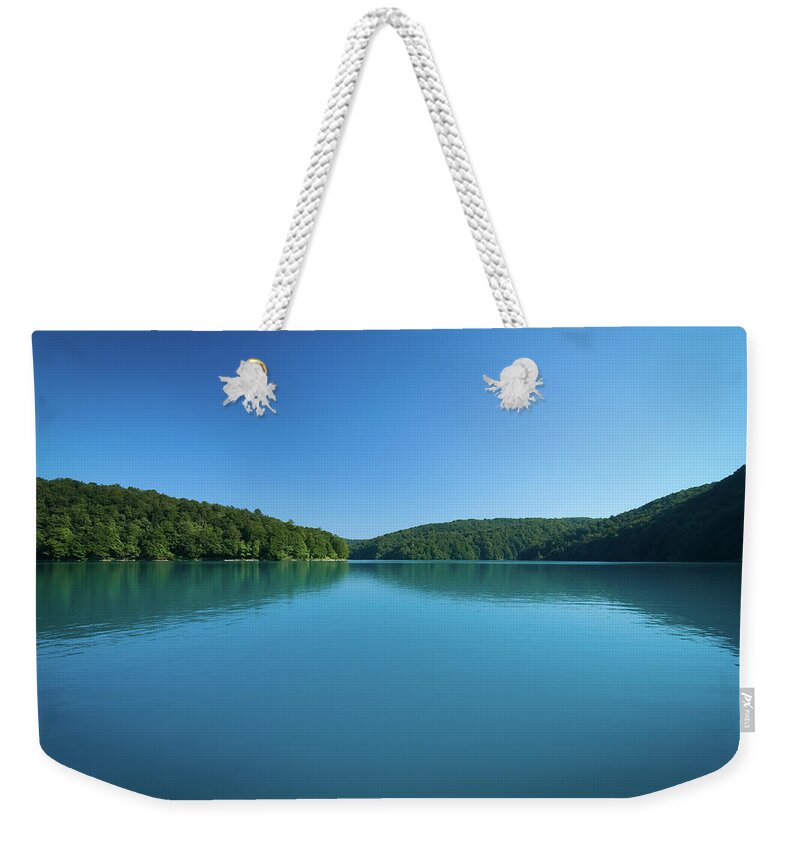 Scenics Weekender Tote Bag featuring the photograph Serene Lake Of Plitvice by F.cadiou