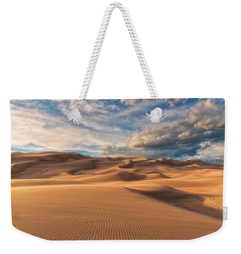 Shadowed Weekender Tote Bag featuring the photograph Shadowed by Russell Pugh