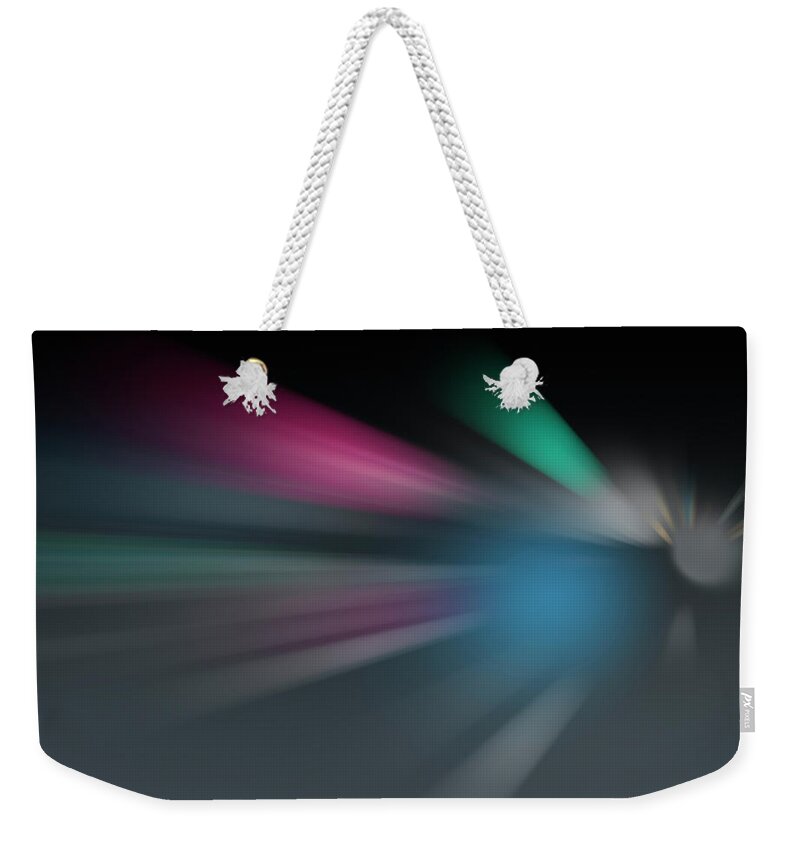 Abstract Weekender Tote Bag featuring the photograph Shafts Of Grey And Colored Light by Ikon Images