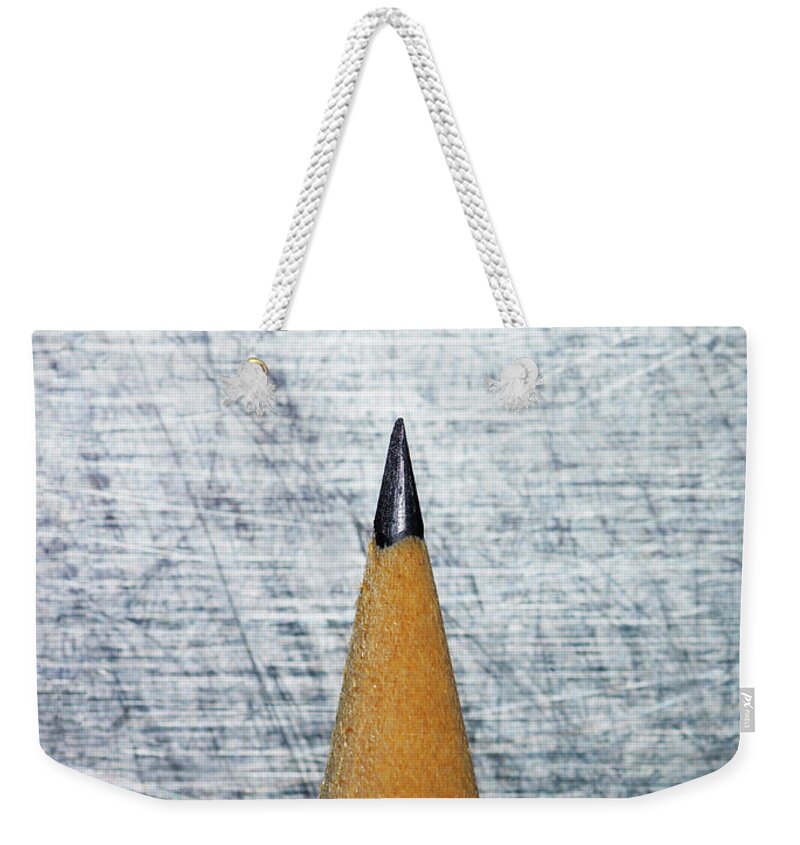 Sharp Weekender Tote Bag featuring the photograph Sharpened Pencil On Stainless Steel by Ballyscanlon