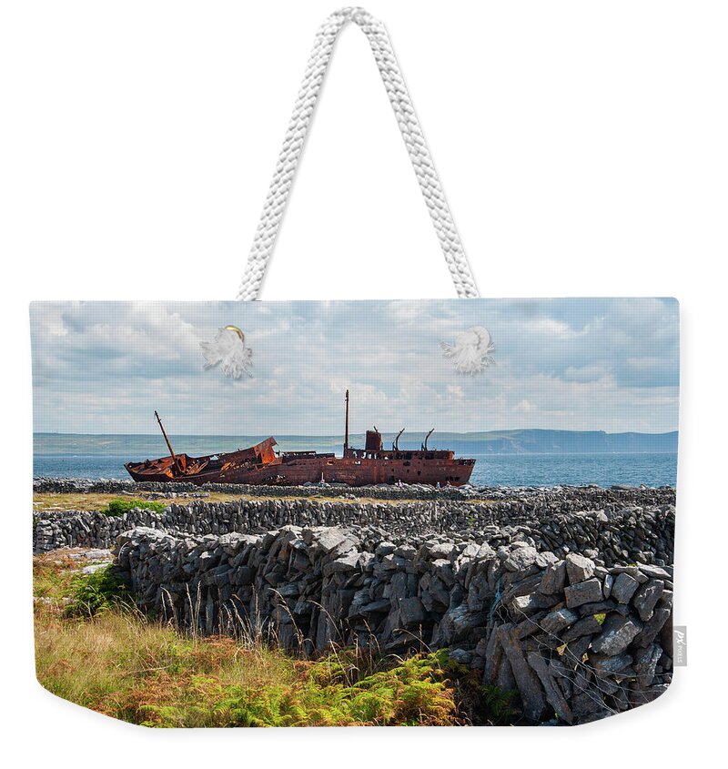 Shipwreck Weekender Tote Bag featuring the photograph Shipwreck on Inisheer by Rob Hemphill