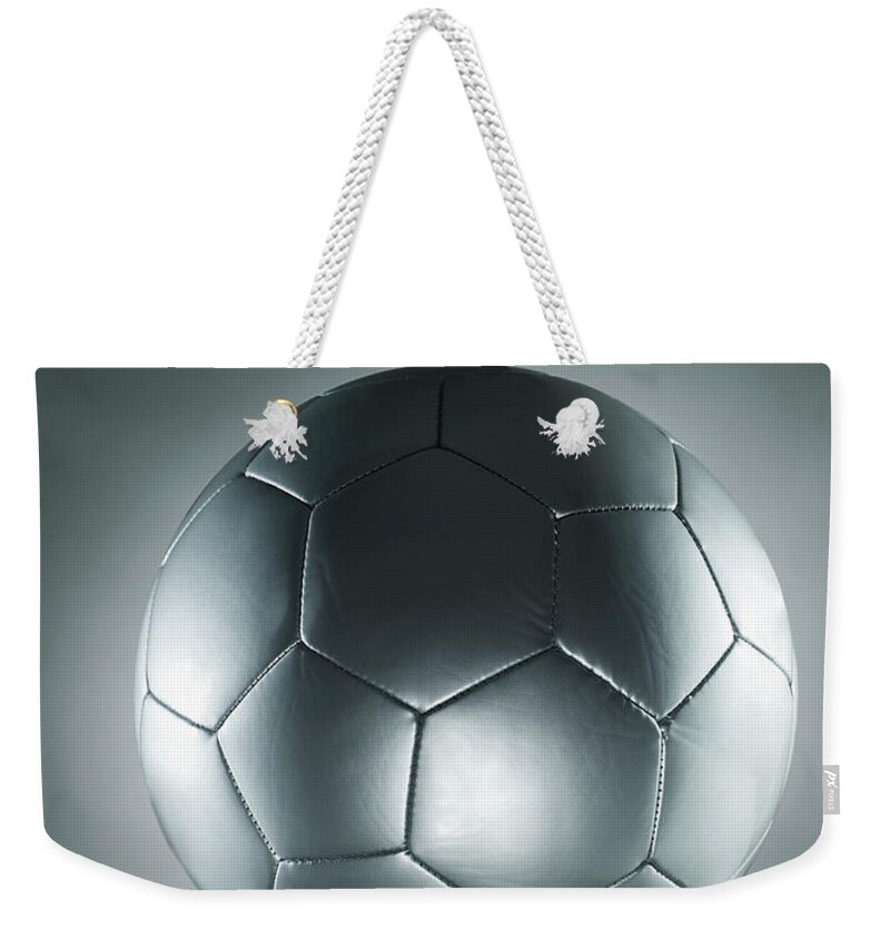 Grass Weekender Tote Bag featuring the photograph Silver Football On Tee Surface Level by Flashpop