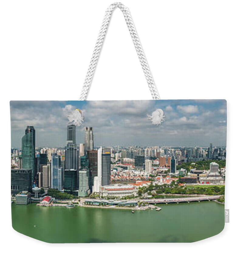 Water's Edge Weekender Tote Bag featuring the photograph Singapore Marina Bay Cbd Aerial by Fotovoyager
