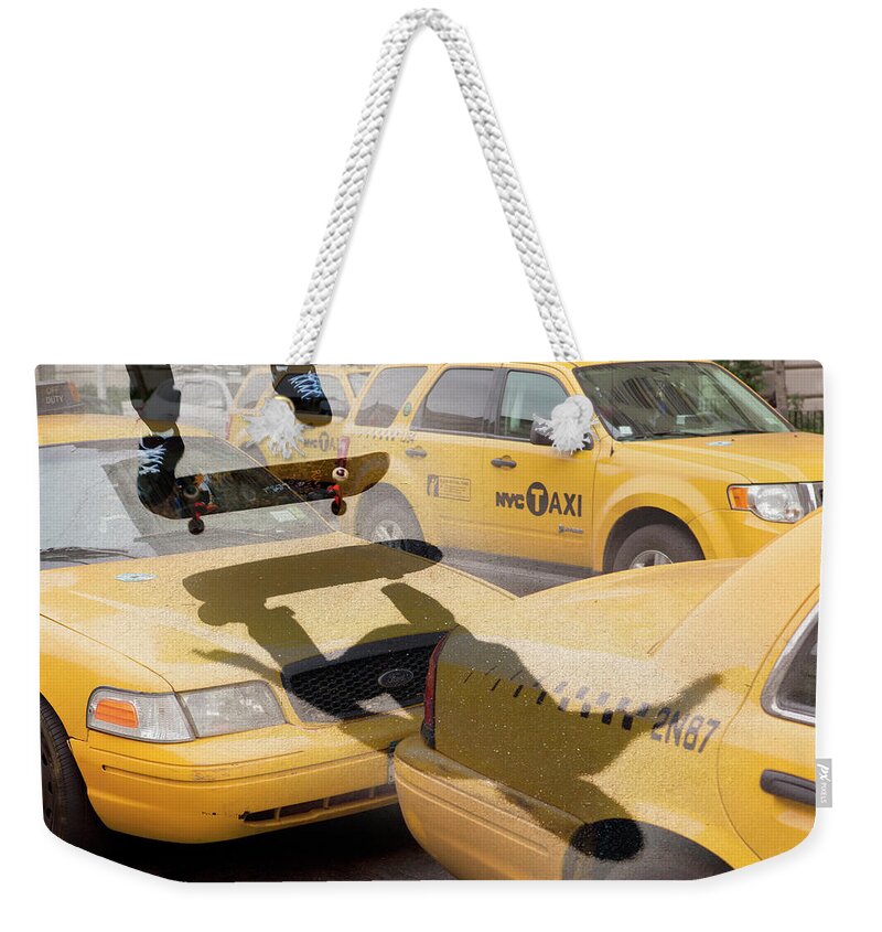 Shadow Weekender Tote Bag featuring the photograph Skate Boarding Over New York Taxis by Nick Dolding