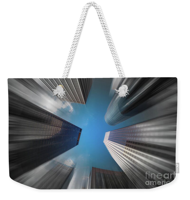 Houston Weekender Tote Bag featuring the photograph Skyscrapers in Motion by Raul Rodriguez