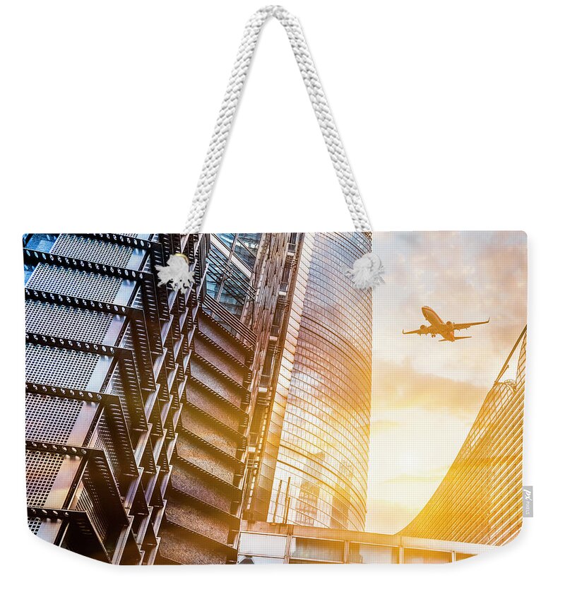 Corporate Business Weekender Tote Bag featuring the photograph Skyscrapers With Airplane by Chinaface