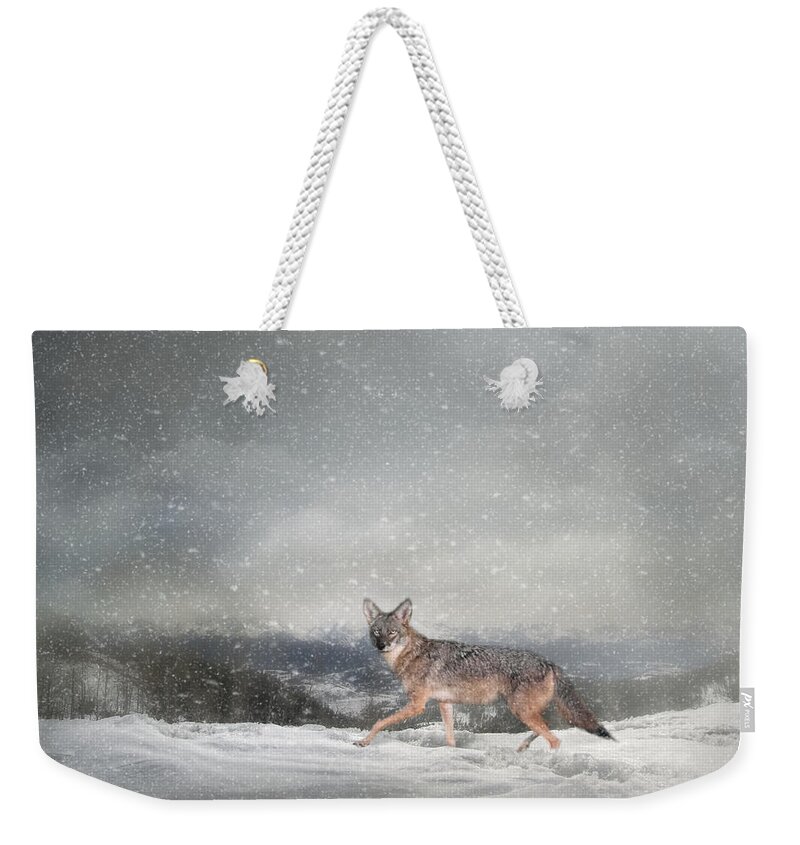 Coyote Weekender Tote Bag featuring the photograph Snow Trekker by Jai Johnson
