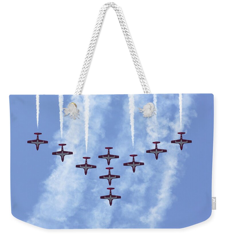 Canada Weekender Tote Bag featuring the photograph Snowbirds Loop by John Daly