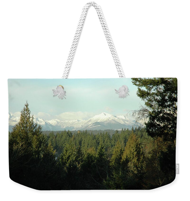 Mountains Weekender Tote Bag featuring the photograph Somewhere outside Seattle by Eric Hafner