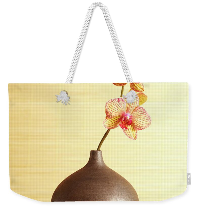 Home Decor Weekender Tote Bag featuring the photograph Spa Still Life Of Orchid Flower In Vase by Gspictures