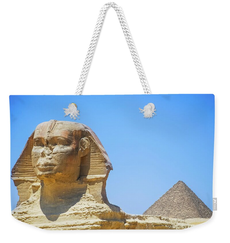 Ancient History Weekender Tote Bag featuring the photograph Sphinx And Pyramid by © Razvan Ciuca